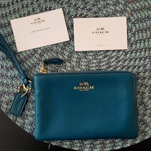blue/teal Coach wristlet